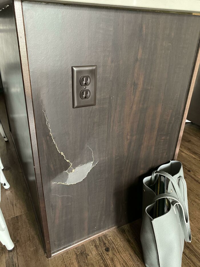 How To Fix My Kitchen Island That My Ex Kicked A Dent In?