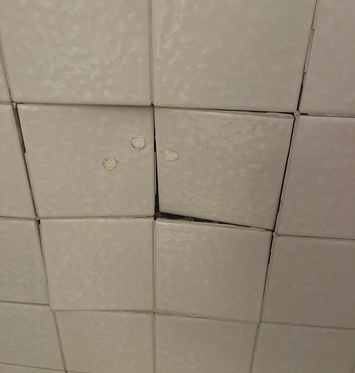 How Can I Fix This? Daughter Was Showering And Randomly Leaned Into The Wall, Causing This