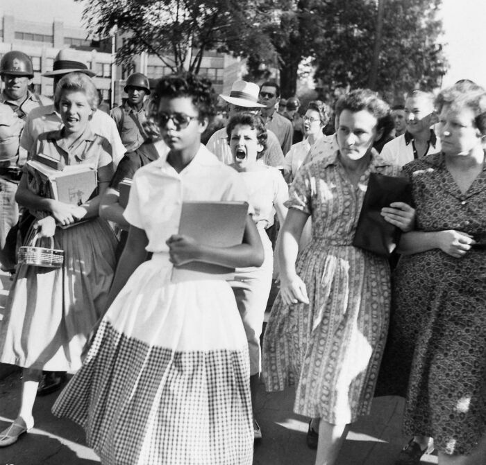 Elizabeth Eckford Ignores The Screams Of Students On Her First Day Integrated Into A Little Rock High School, 1957