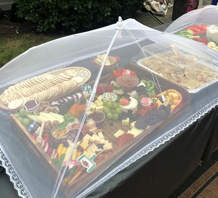 Keep Your Picnic Spread Fresh With The Food Cover: Your Handy Protector For Outdoor Culinary Delights