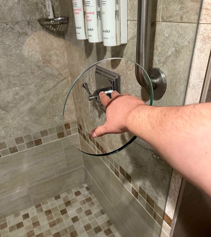 My Hotel Room Shower Has A Circular Cutout In The Glass That Lets You Turn On The Water Without Getting Wet