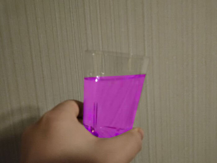 This Glass Has Clear Water In It, But Your Brain Sees It As Magenta. That's Because I Changed The Color In Photoshop