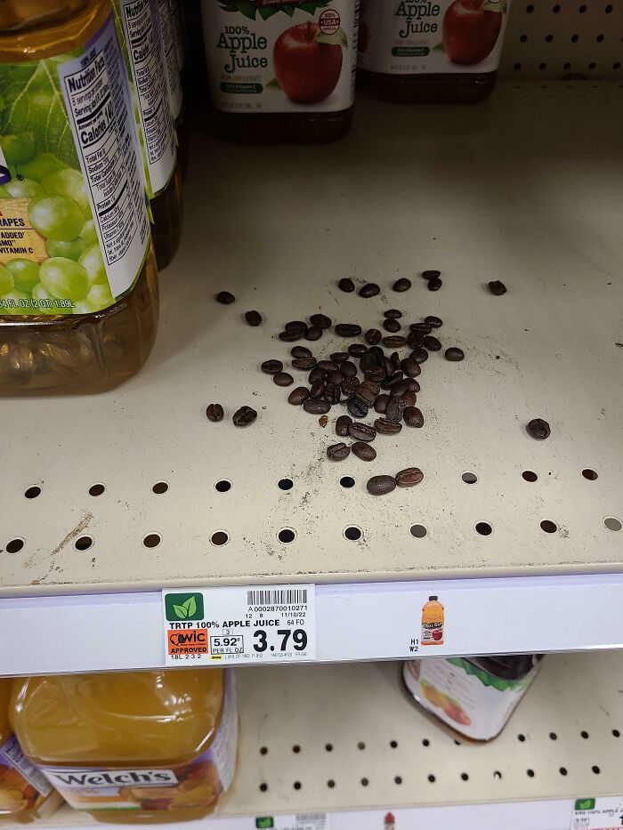 There Were Coffee Beans Pretending To Be Apple Juice. I Wasn't Fooled And Successfully Bought Juice