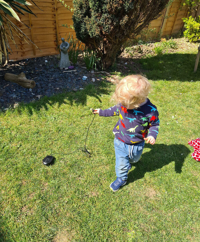 My Son Taking His Mouse For A Walk Around The Garden