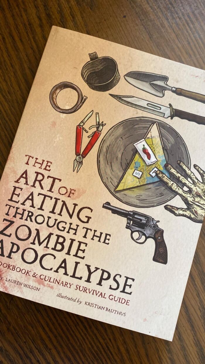 Nothing Screams 'Priorities' Louder Than 'The Art Of Eating Through The Zombie Apocalypse' Book. Chew Before You're Chewed