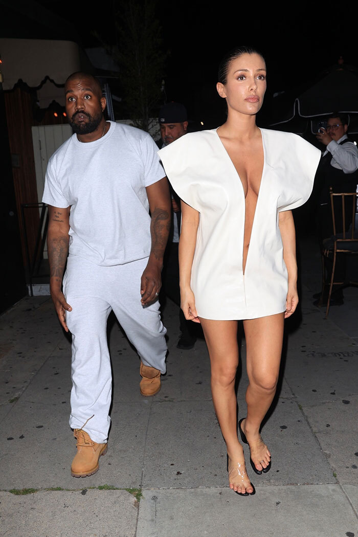 Bianca Censori Channels Kanye West’s Ex-Wife In Plunging Dress That Screams “Kim Kardashian”