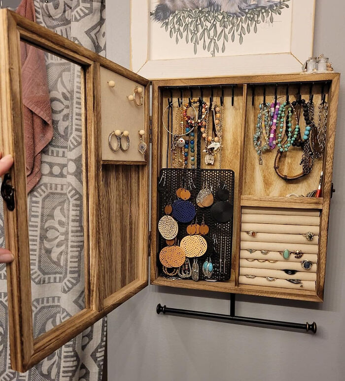 Organize Your Jewelry Collection Using A Wall-Mounted Jewelry Organizer That's Tiny Enough For Those Cozy Corners
