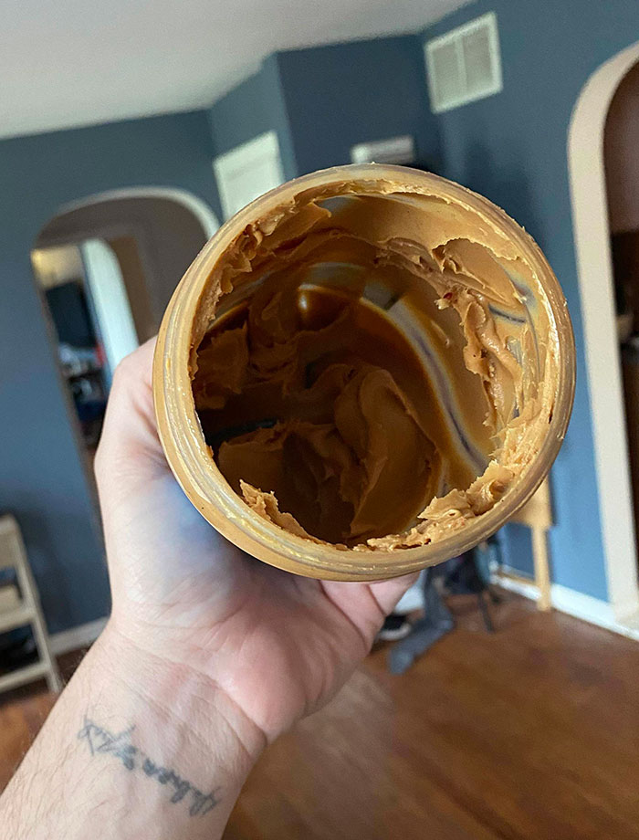My Wife Putting This Peanut Butter In The Trash Because "It's Empty"