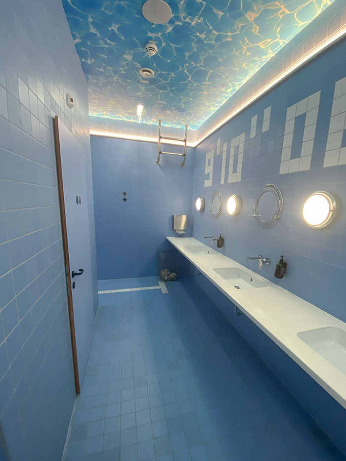 Pool-Themed Restrooms In A Hotel