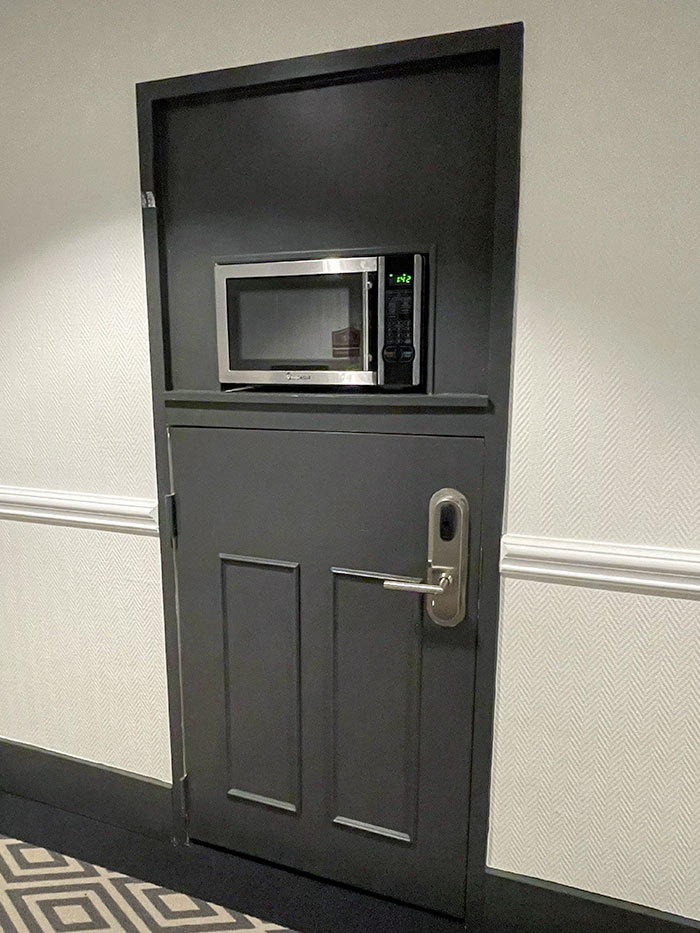 The Hotel I’m Staying At Has One Room Door With A Microwave Mounted In It