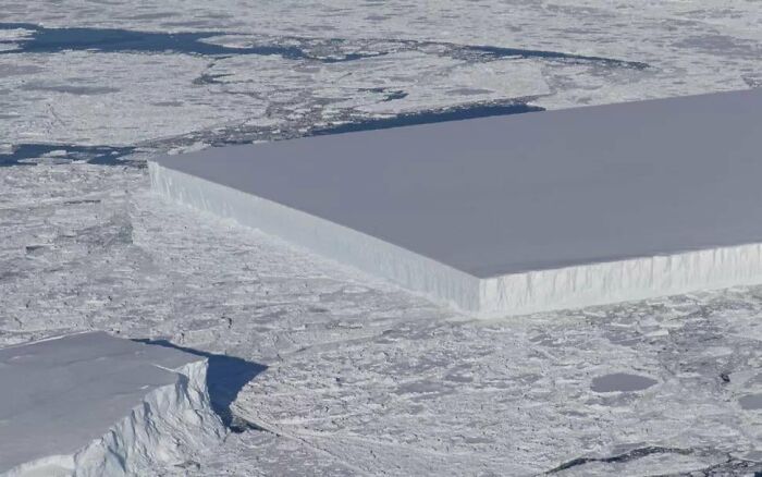 In 2018, During A Research Flight Above The Antarctic Peninsula, An Unusually Angular Iceberg Was Spotted Floating Amid Sea Ice. It’s About 3,000 Feet (900 Meters) Wide And 5,000 Feet (1,500 M) Long