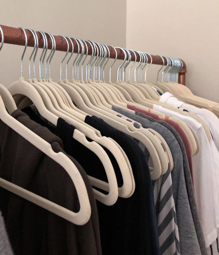 Never Hunt For A Shirt In A Messy Closet Again, Thanks To These Amazon Basics Slim Velvet Clothes Hangers!