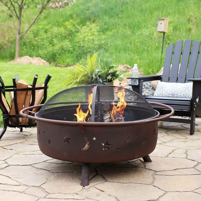 Ignite Your Evenings With The Steel Fire Pit: Your Backyard's Focal Point For Warmth And Ambiance