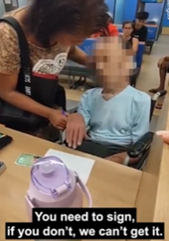 "Uncle, Are You Listening?": Woman Wheels Pensioner's Body Into Bank To Get Him To Sign Off Loan