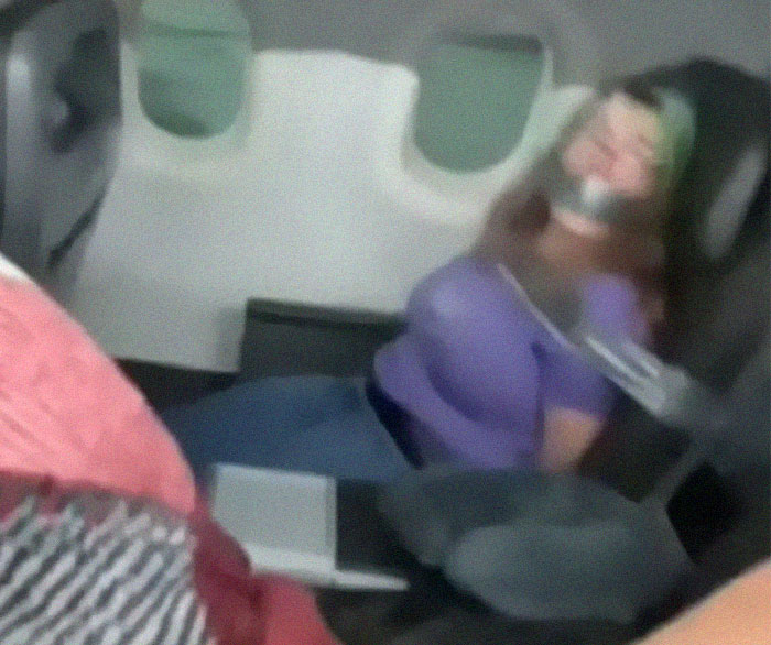This Unhinged Karen Who Hit And Bit Flight Attendants And Other Passengers On An American Airlines Flight Last July And Was Tied And Duct-Taped To Her Seat Was Fined $82,000