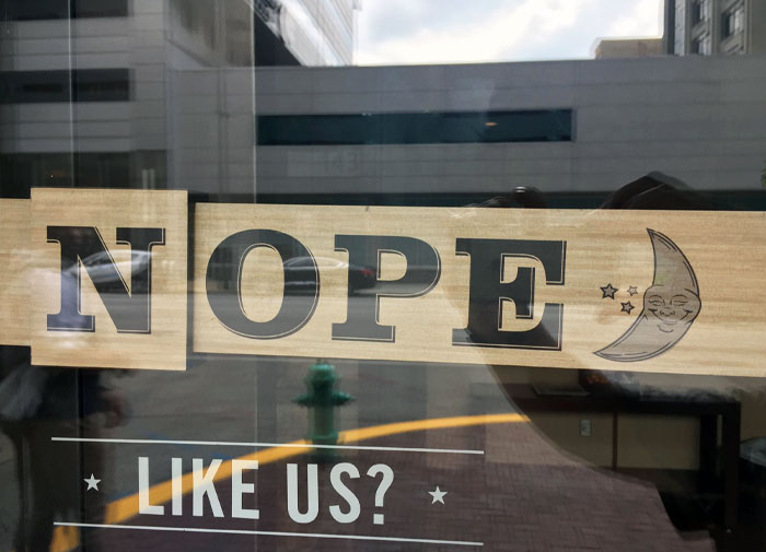 This Use Of The N In An Open Sign At A Cafe