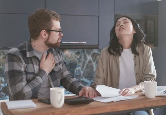 Husband's surprise plan makes wife emotional at kitchen table on Mother's Day. Husband's surprise plan makes wife emotional at kitchen table on Mother's Day.