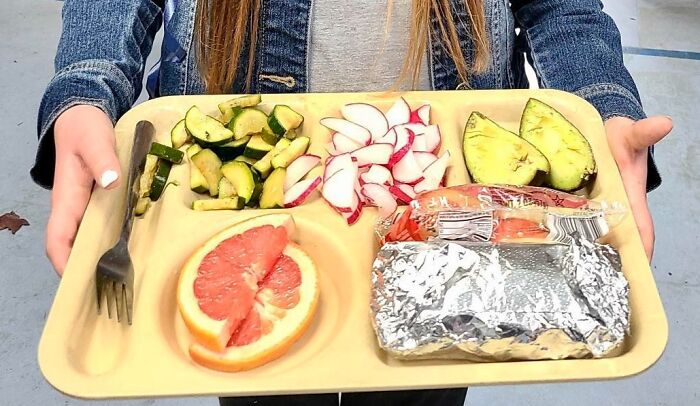 School Lunch In California (Free). Zucchini, Radish, Avocado Slices, Grapefruit, Apples In The Bag, And A Bean And Cheese Burrito From A Local Restaurant. The Cafeteria Is Buffet Style