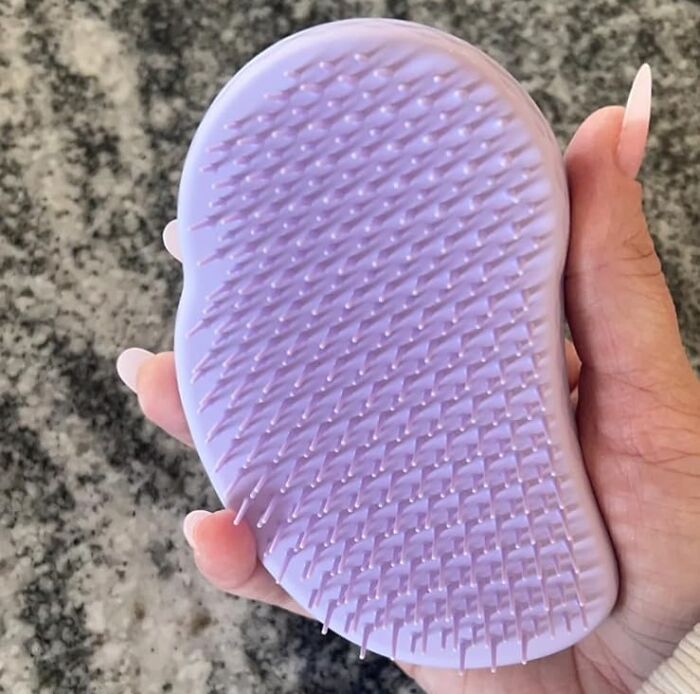 Every Fly Girl Knows She Needs The Original Mini Detangling Brush To Tame Her Travel Tresses 