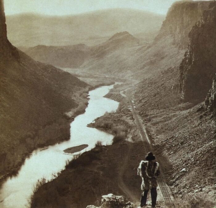 This Photograph Shows A Native American Man Looking Over The Newly Completed Transcontinental Railroad In Nevada In The Year 1869. Let's Assume The Man Was Around Forty And Was Born In The 1820s. The Changes He Must Have Seen Are Astonishing