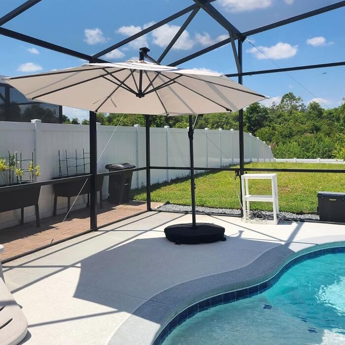 This Offset Patio Umbrella Does Away With That Pesky Pole In The Middle Of Your Conversation