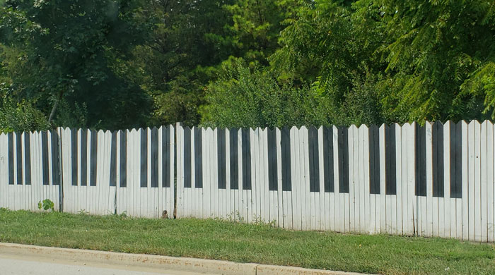 My Neighbor Has His Fence Painted Like A Piano