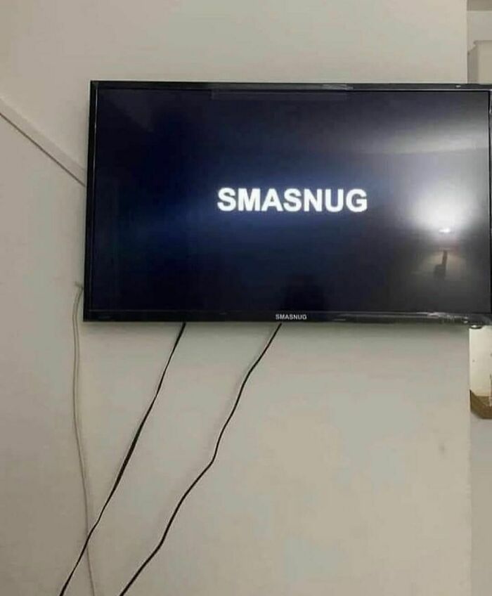 TV screen with the word SMASNUG displayed, featuring random and cringe humor for those with a unique sense of humor.