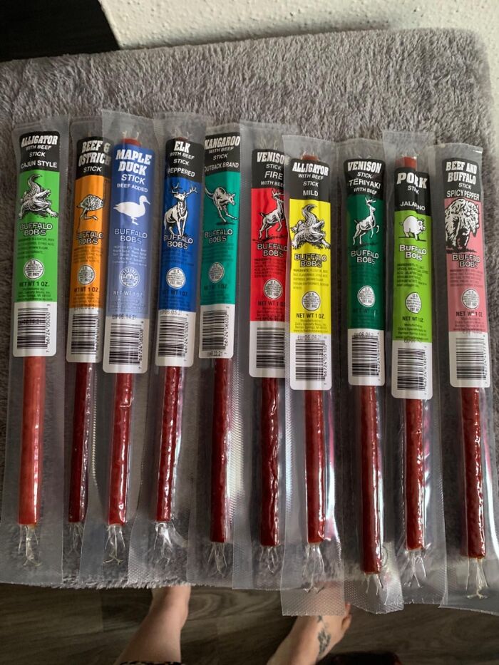 Assorted exotic meat sticks including alligator, elk, kangaroo, venison, and pork snacks from Buffalo Bobs brand. Assorted exotic meat sticks including alligator, elk, kangaroo, venison, and pork snacks from Buffalo Bobs brand.