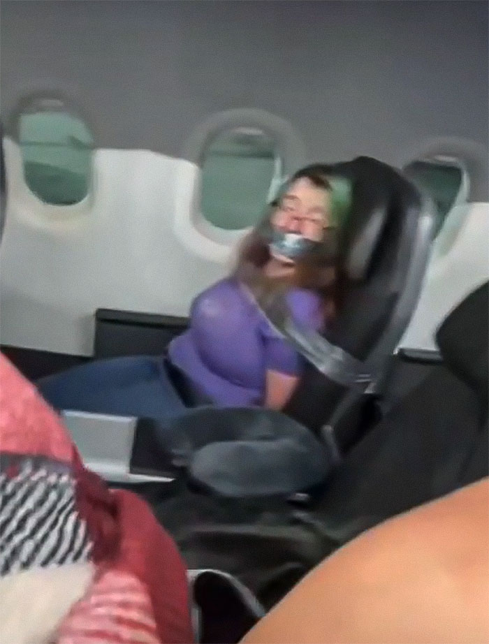 Passenger Who Went Viral After Being Duct-Taped To Airplane Seat Is Sued For Nearly $82k Passenger Who Went Viral After Being Duct-Taped To Airplane Seat Is Sued For Nearly $82k
