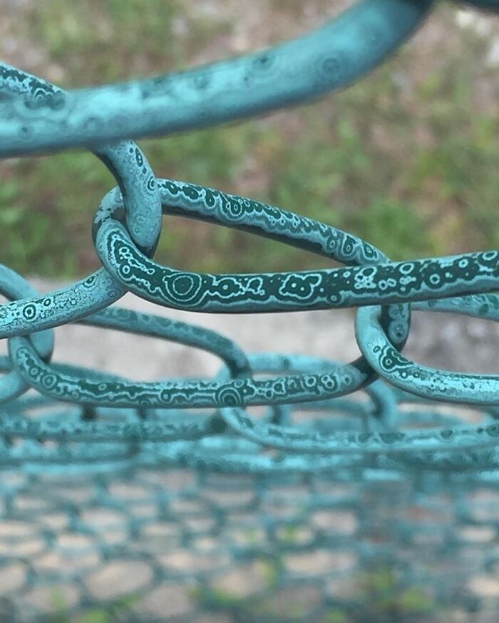 Close-up of a weathered blue chain with unique patterns, one of the intriguing photos shared on Instagram.