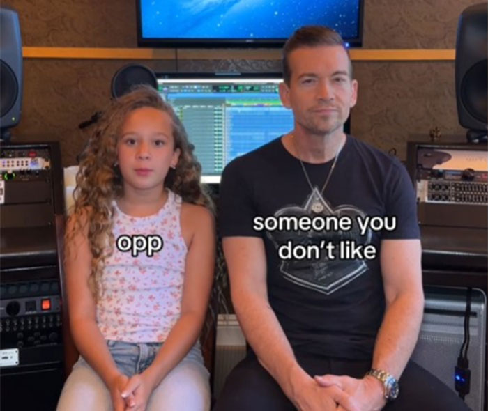 Dad and daughter sitting in a studio, with text explaining Gen Alpha slang. Dad and daughter sitting in a studio, with text explaining Gen Alpha slang.