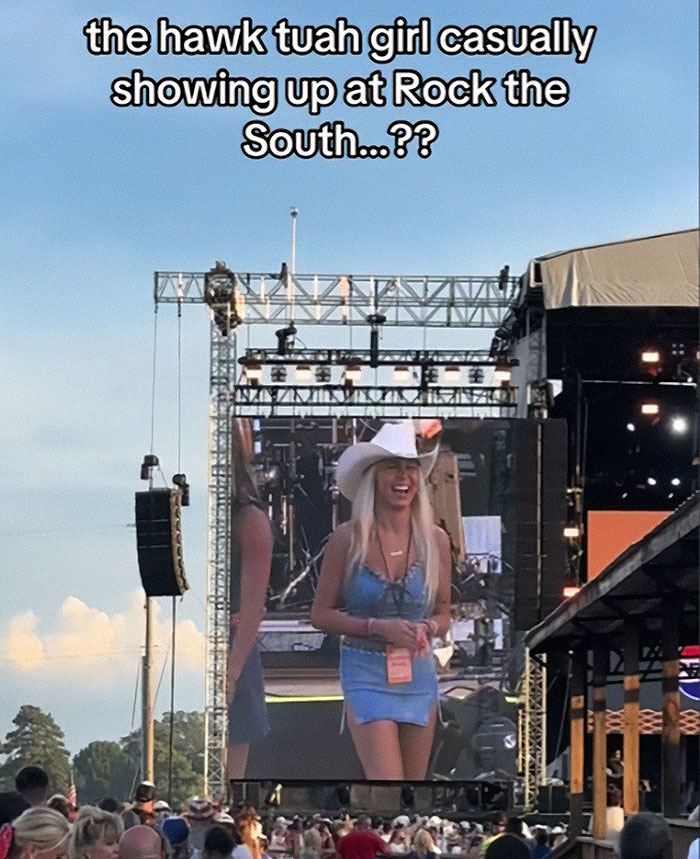 Hawk Tuah Girl on stage at Rock the South in a blue outfit and white cowboy hat. Hawk Tuah Girl on stage at Rock the South in a blue outfit and white cowboy hat.