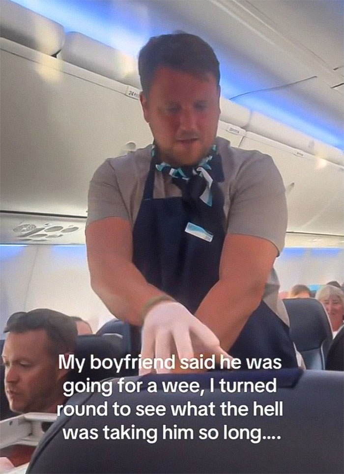 Woman Baffled To See Flight Attendant Is Her Boyfriend After He Got Up To Use The Restroom Woman Baffled To See Flight Attendant Is Her Boyfriend After He Got Up To Use The Restroom