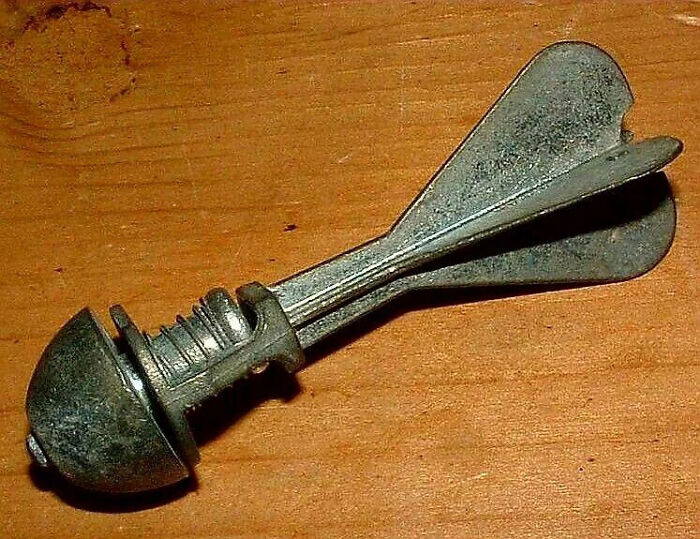 Vintage metal toy airplane on wooden surface, an item that may remind you of your creaking joints nostalgia.