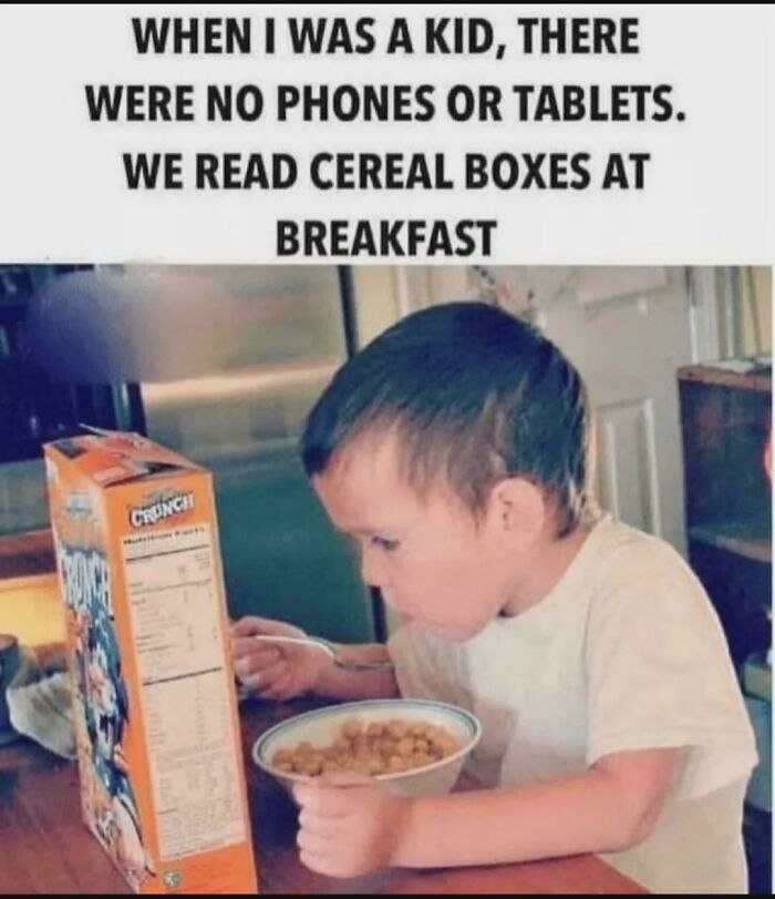 Child reading a cereal box at breakfast, reminding you of creaking joints from nostalgia and old memories.