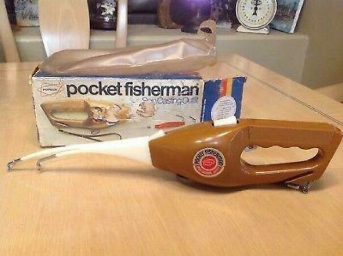 Vintage Pocket Fisherman fishing rod and reel combo on table, classic item that may remind you of creaking joints nostalgia.