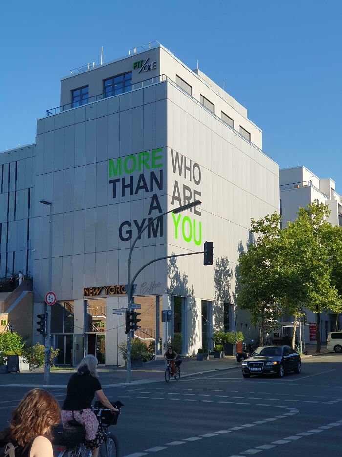 Sign on building reads, "More than a gym who are you," unintentionally creating a sign fail.
