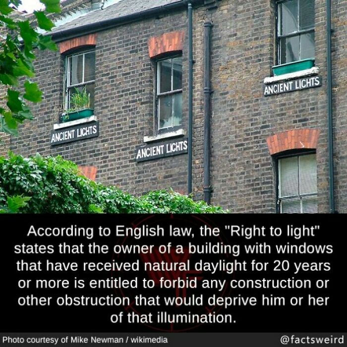 Brick building with multiple windows labeled ancient lights illustrating English law fun facts about natural daylight rights.