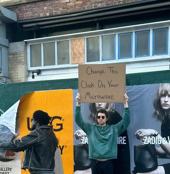 Clever-Dude-With-Sign-Annoying-Things-Protesting