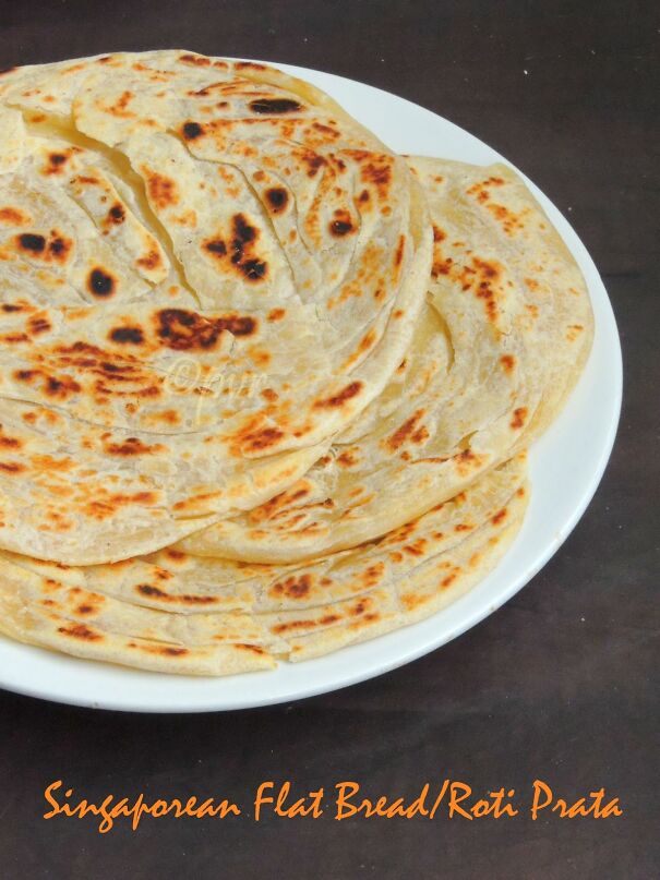 Singaporean-flat-bread-Roti-prata-66ccb9b504016.jpg
