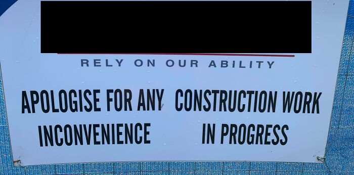 Sign fail with awkward message arrangement about construction and inconvenience.