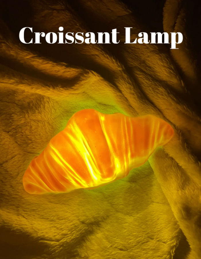 Stunned Woman Takes A Bite Out Of Her Temu Croissant Lamp, Turns Out “It’s Literally Food” Stunned Woman Takes A Bite Out Of Her Temu Croissant Lamp, Turns Out “It’s Literally Food”
