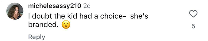 Comment questioning tattoo choice, saying, "I doubt the kid had a choice—she's branded," showing disapproval. Comment questioning tattoo choice, saying, "I doubt the kid had a choice—she's branded," showing disapproval.