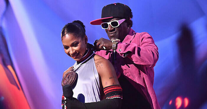 Jordan Chiles Emotional As Flavor Flav Gifts Her A Bronze Clock At VMAs: “You Deserve Everything”