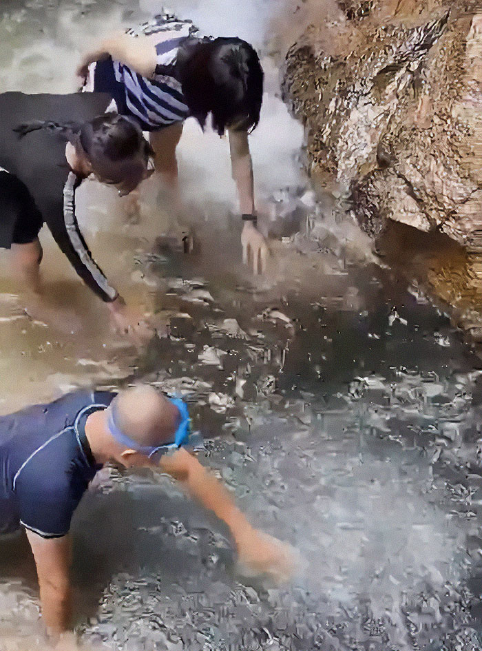 Man Jumps Off Cliff Into Water Hole And Completely Disappears, People Frantically Search For Him Man Jumps Off Cliff Into Water Hole And Completely Disappears, People Frantically Search For Him