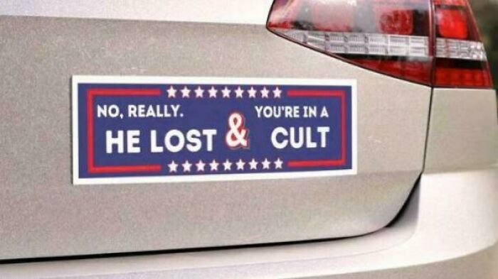 Bumper sticker sign fail with humorous message about losing and cult on a car.