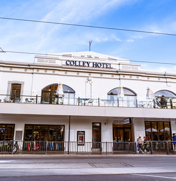 Colley Hotel exterior with patio seating, related to face tattoos incident. Colley Hotel exterior with patio seating, related to face tattoos incident.