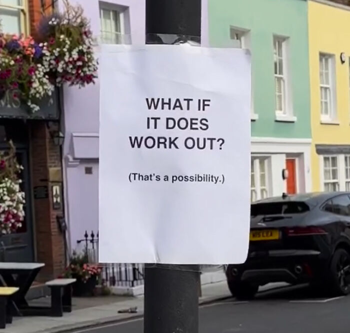 Wholesome message on a paper taped to a street pole in London asking what if it does work out as a possibility.