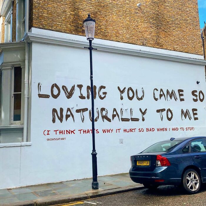 Street art in London with a wholesome message about love, reflecting heartfelt sentiments directly from the streets to people's hearts.
