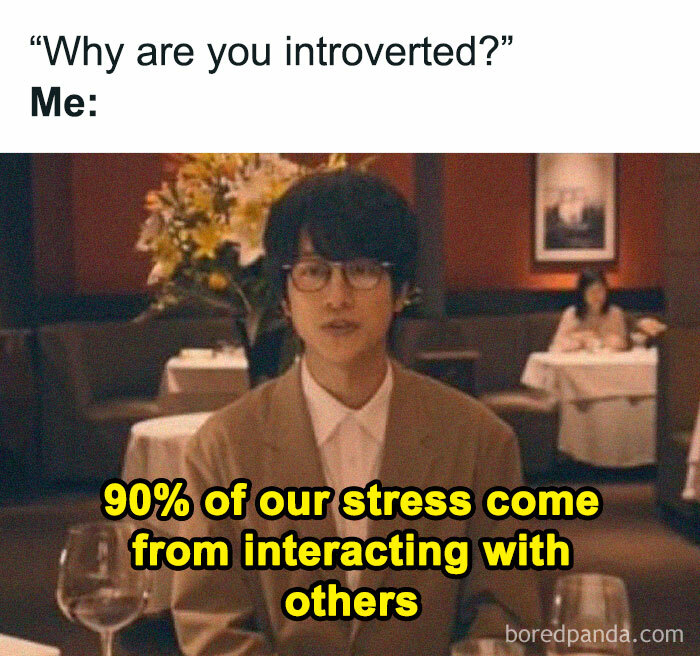 Person at a restaurant, expressing stress from interacting with others, with a humorous caption about being introverted.